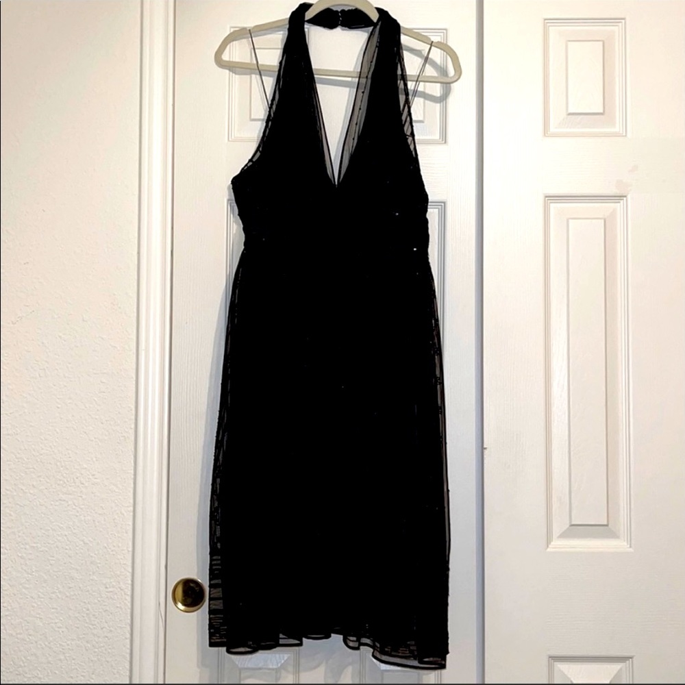Adorable black sequins and lace party dress. Halter style.